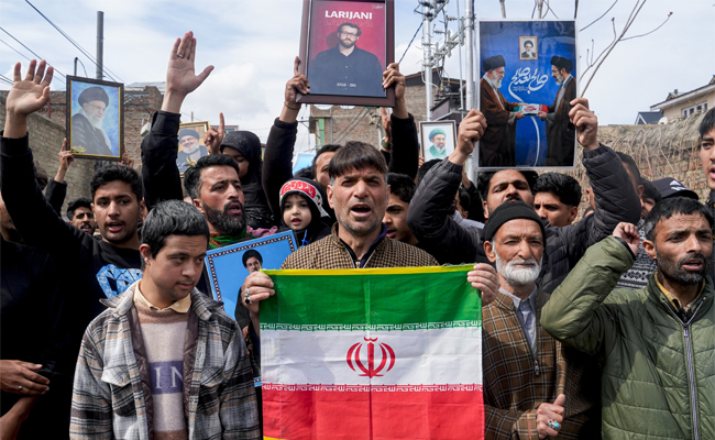 Peaceful protests held in Kashmir after Eid prayers condemning attacks on Iran